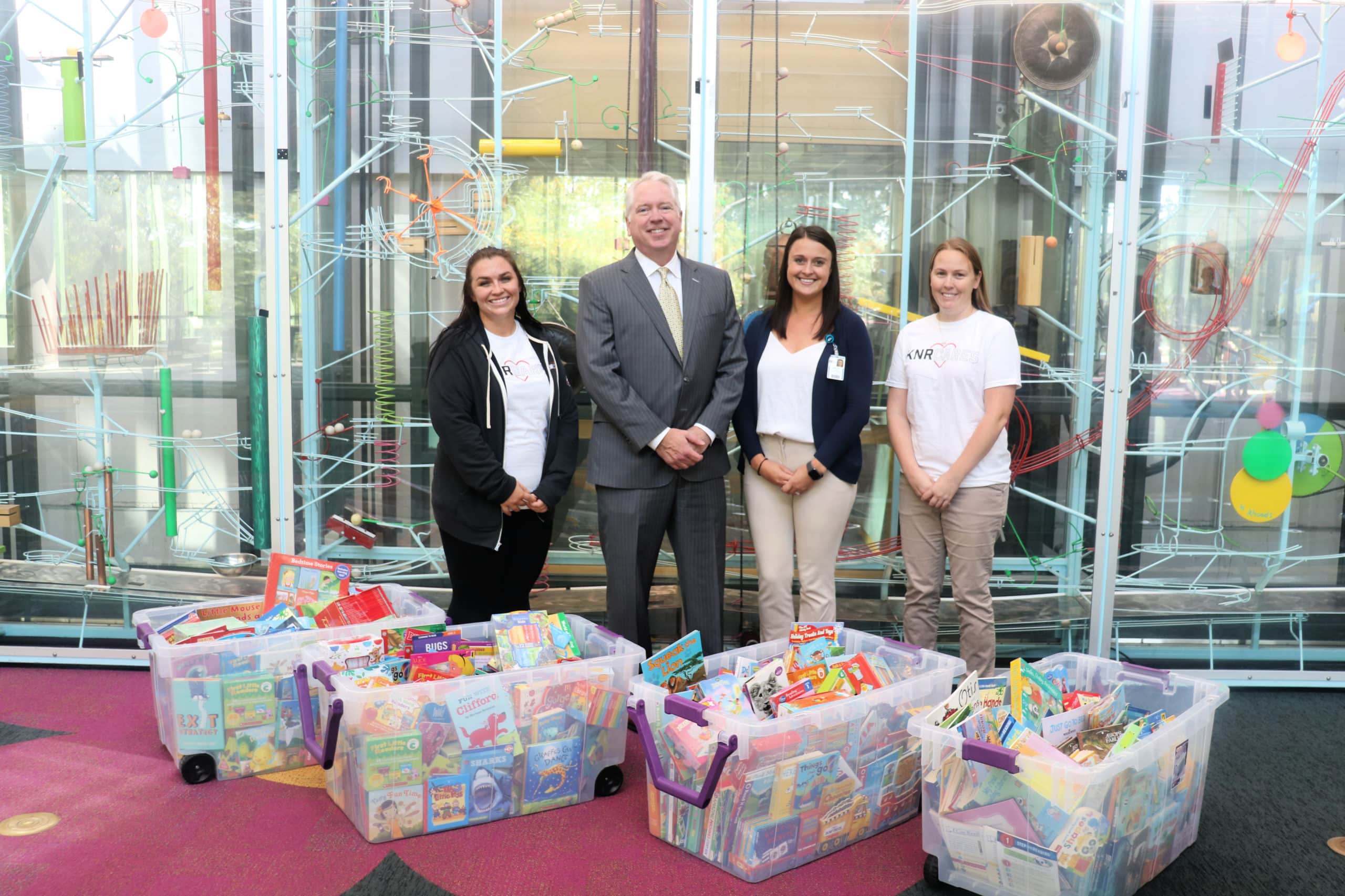 Fairlawnheadquarted law firm donates thousands of books to Akron