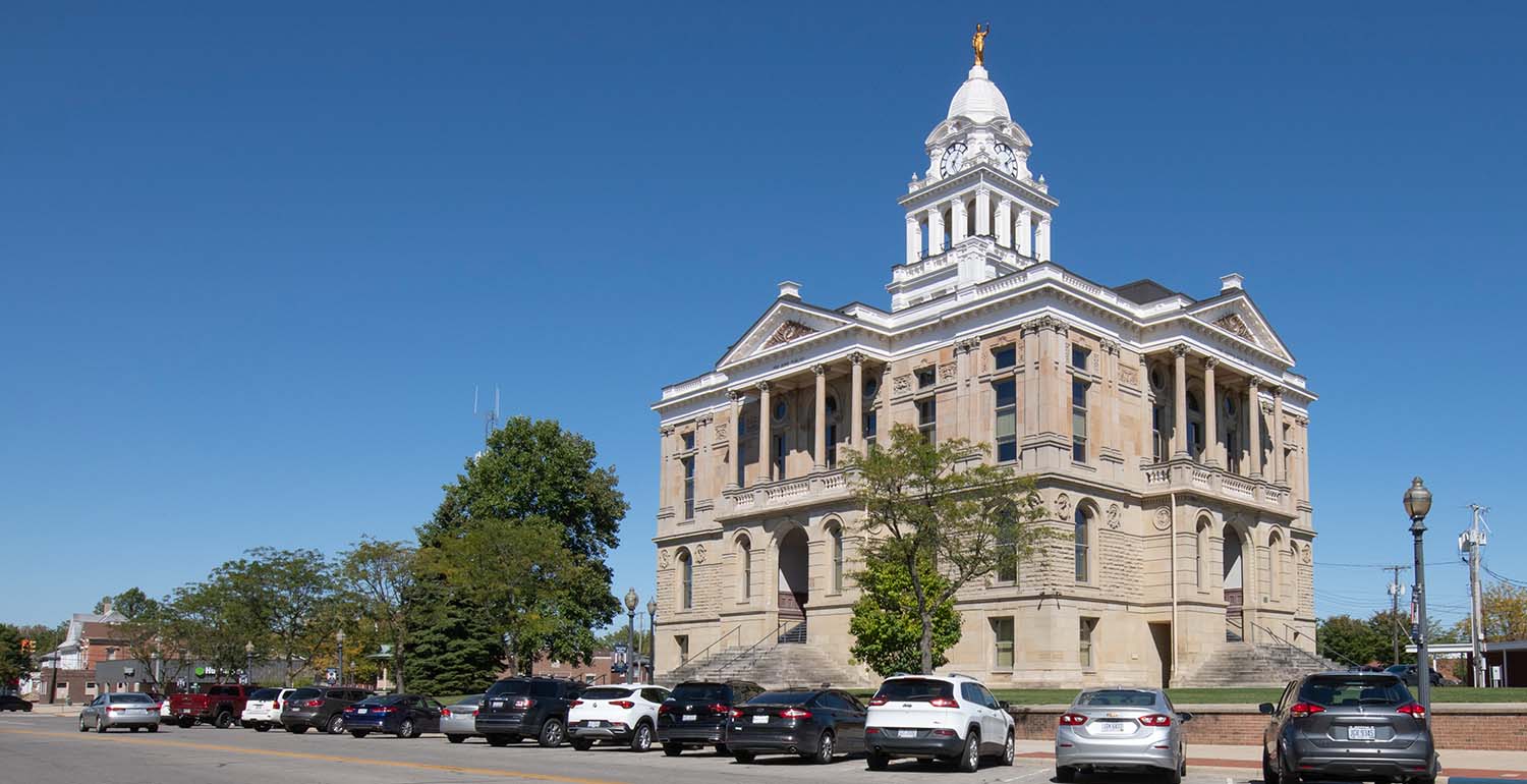 Courthouse building on street corner in Fayette County