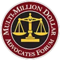 A circular logo with a gold justice scale in the center, surrounded by a red border with the white text Multi-Million Dollar Advocates Forum.