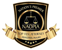 Gold and black shield emblem with scales of justice, reading “Nation’s Premier NAOPIA Top Ten Attorney Personal Injury” on a gold ribbon with decorative stars at the bottom.