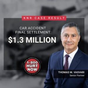 A man in a suit stands next to text stating, “KNR Case Result. Car accident final settlement: .3 million.” Below is a badge with “1-800 Hurt Now” and the name “Thomas M. Vasvari, Senior Partner.”.