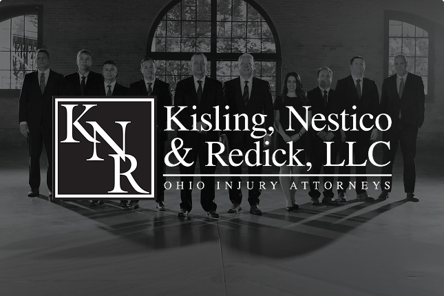 KNR logo overlayed on top of a photo of KNR attorneys