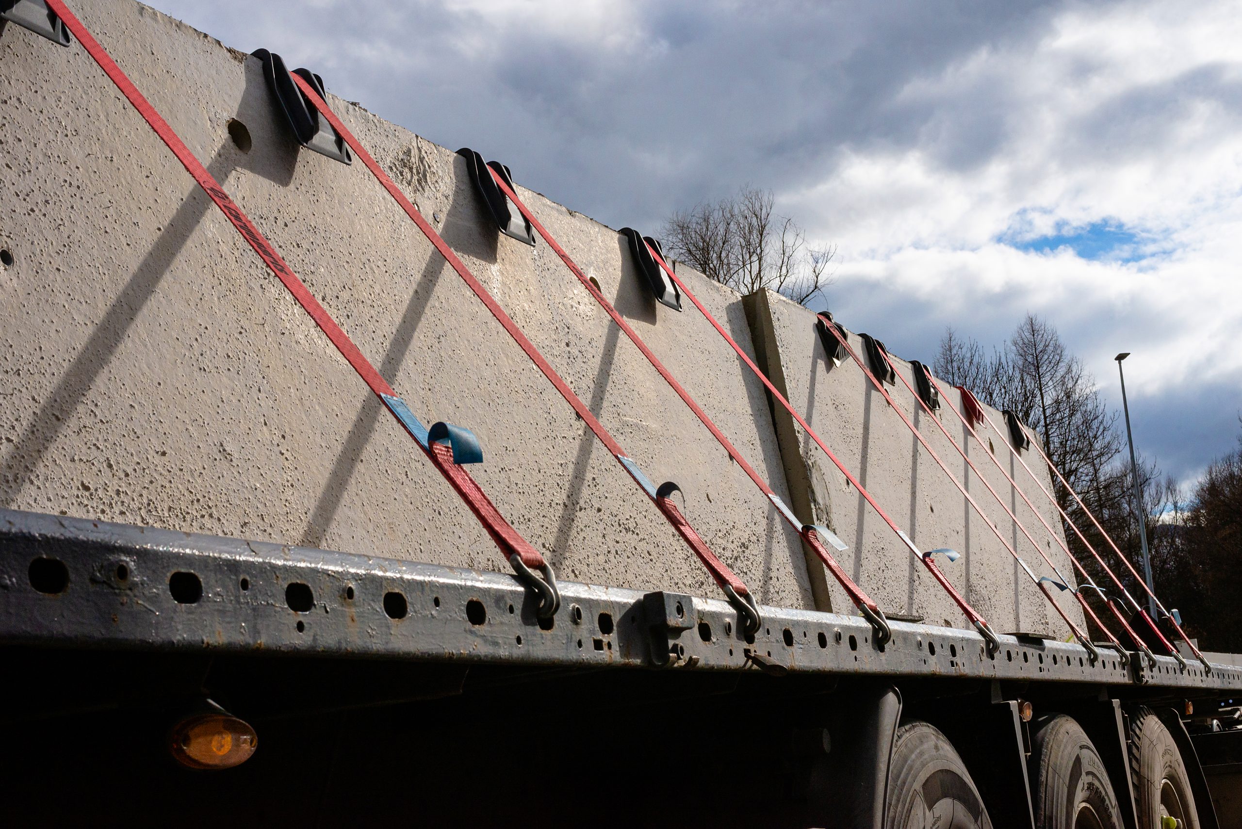 Cement blocks tied down to a trailer in Ohio. When cargo falls, people can be severely injured